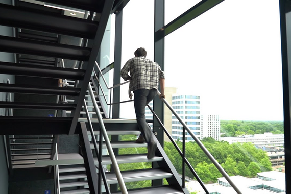 Students climb the stairs of Atlas for the Eindhoven Championship in Stair Climbing