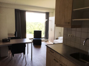 Zitje en keuken. Zitje en keuken.